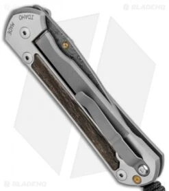 Chris Reeve Large Sebenza 21 Knife W/ Bog Oak Inlays (3.625" Raindrop Damascus) -Chris Reeve Store Chris Reeve Large Sebenza 21 Bog Oak Inlays Raindrop Damascus BHQ 87901 er side