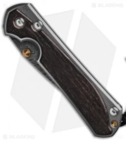 Chris Reeve Store -Chris Reeve Store Chris Reeve Large Sebenza 31 Bog Oak Boomerang Damascus Right Hand BHQ 137818 td spine 2