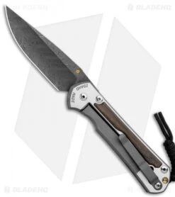 Chris Reeve Large Sebenza 31 Bog Oak (3.62" Boomerang Damascus) Left Hand -Chris Reeve Store Chris Reeve Large Sebenza 31 LEFT HAND Bog Oak Boomerang Damascus BHQ 118511 JR left