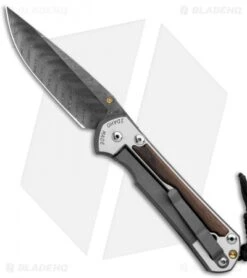 Chris Reeve Large Sebenza 31 Macassar Ebony (3.62" Boomerang Damascus) Left Hand -Chris Reeve Store Chris Reeve Large Sebenza 31 LEFT HAND Macassar Ebony Boomerang Damascus BHQ 118513 JR left