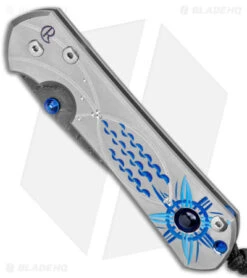 Chris Reeve Large Sebenza 31 Unique Graphic Lolite Inlay (3.6" Boomerang Damasc) -Chris Reeve Store Chris Reeve Large Sebenza 31 Unique Graphic Lolite Boomerang Damascus BHQ 144655 jr spine